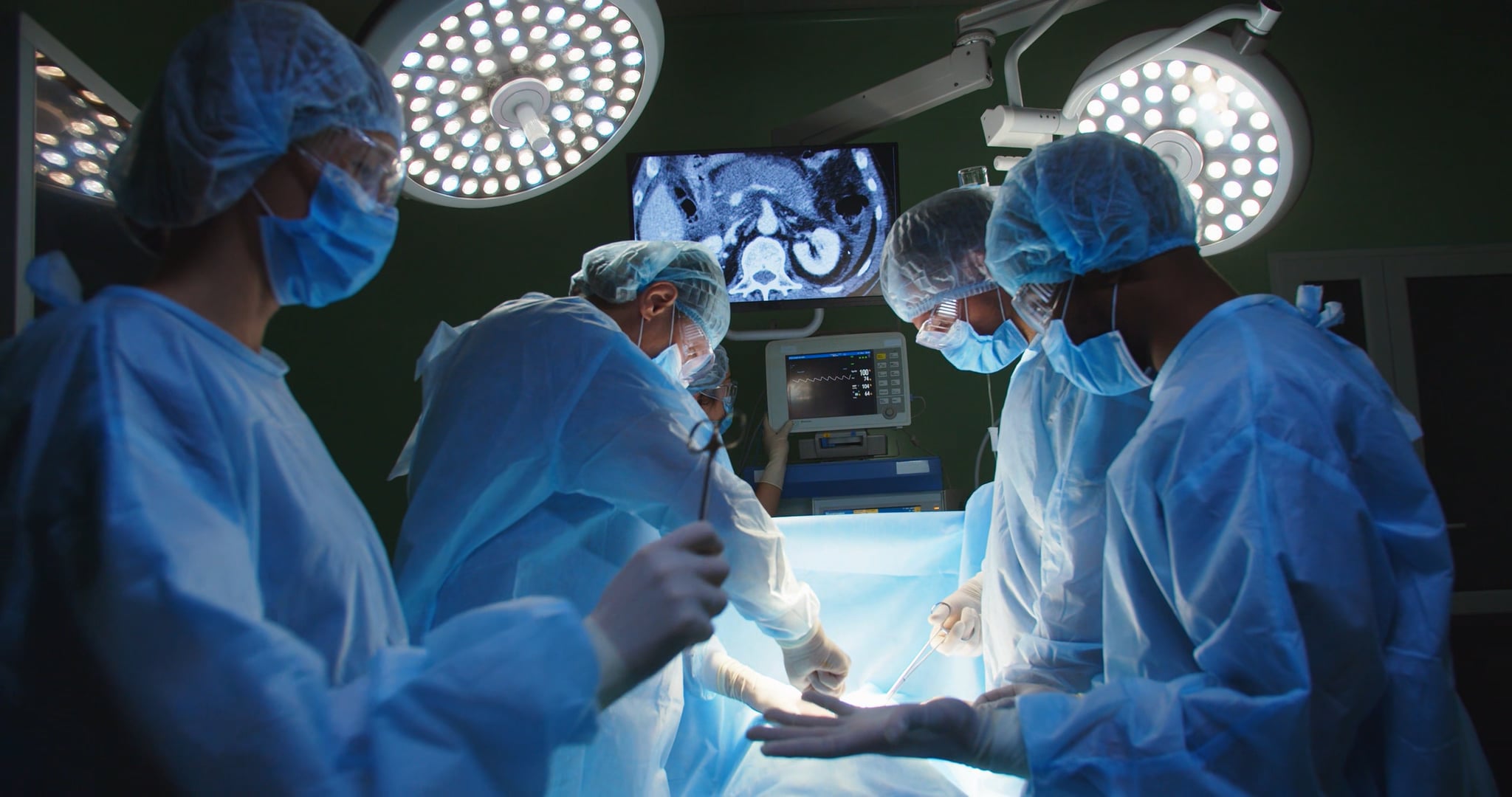 Clinical team collaborating in a hospital operating room